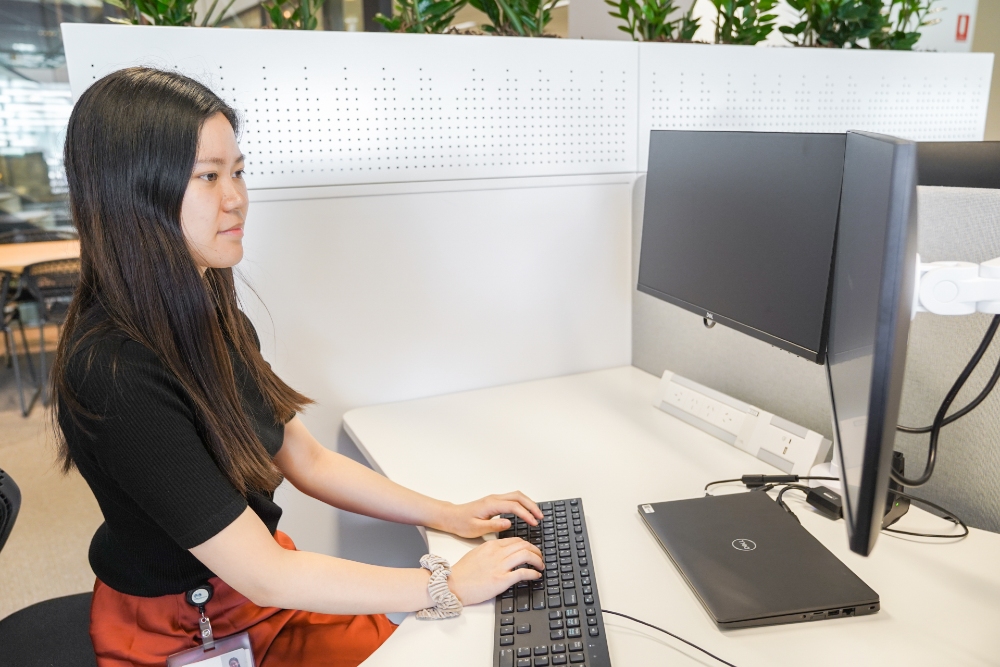 Typing in front of computer