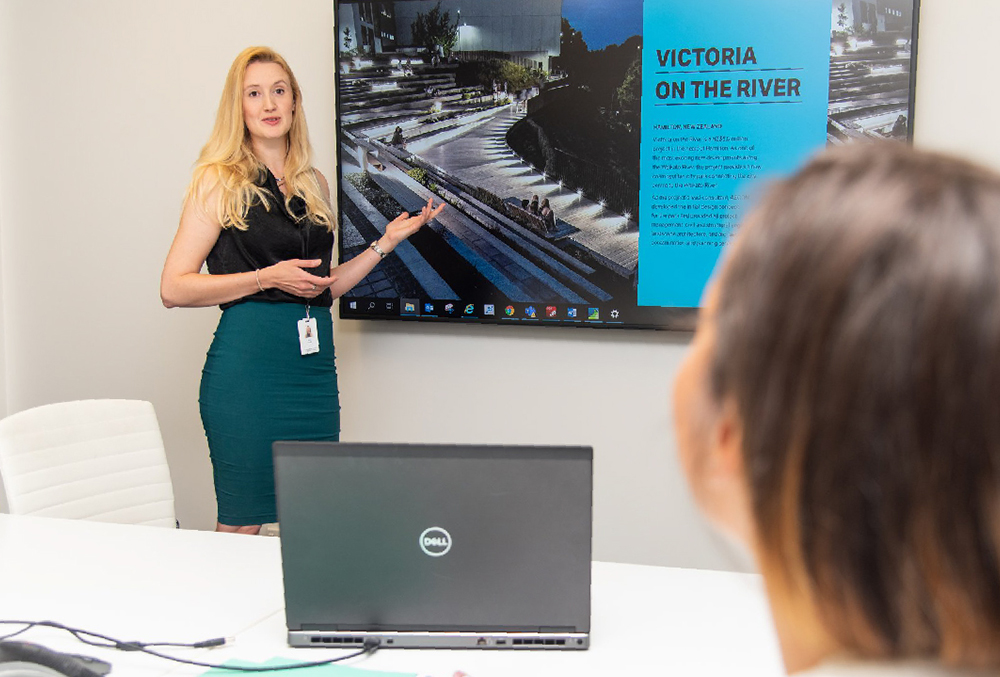AECOM Graduate Sarah Jane Fausset in a meeting