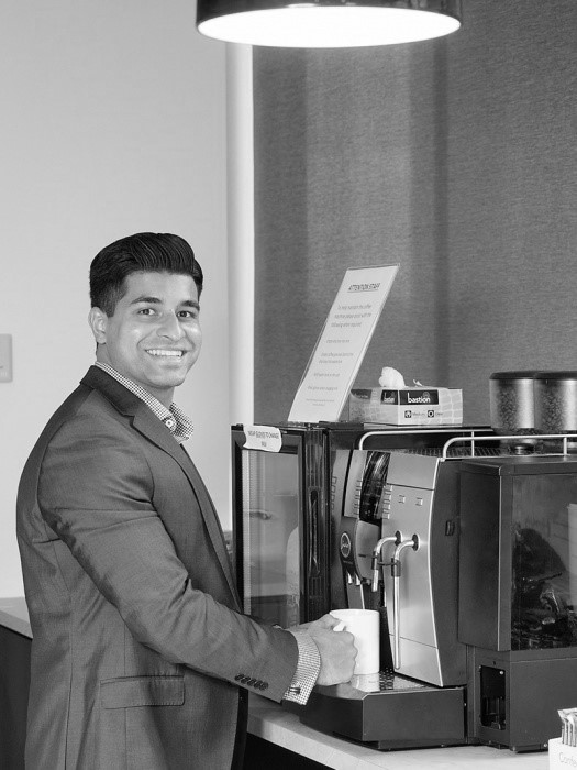 Jithin Xavier DXC Graduate having coffee
