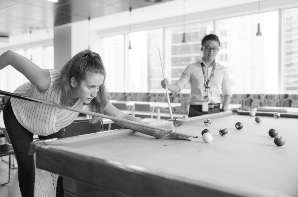 DXC Technology Carla Fleisher Petersen playing billiards