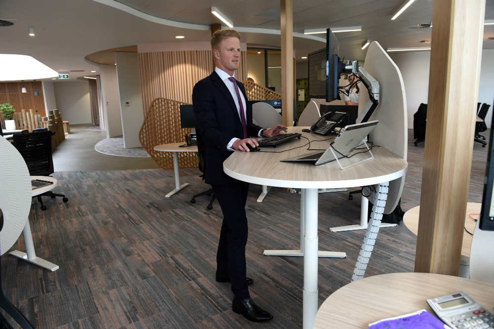 Day-in-a-life-Macpherson-Kelley-Jereome-Keating-work-at-desk