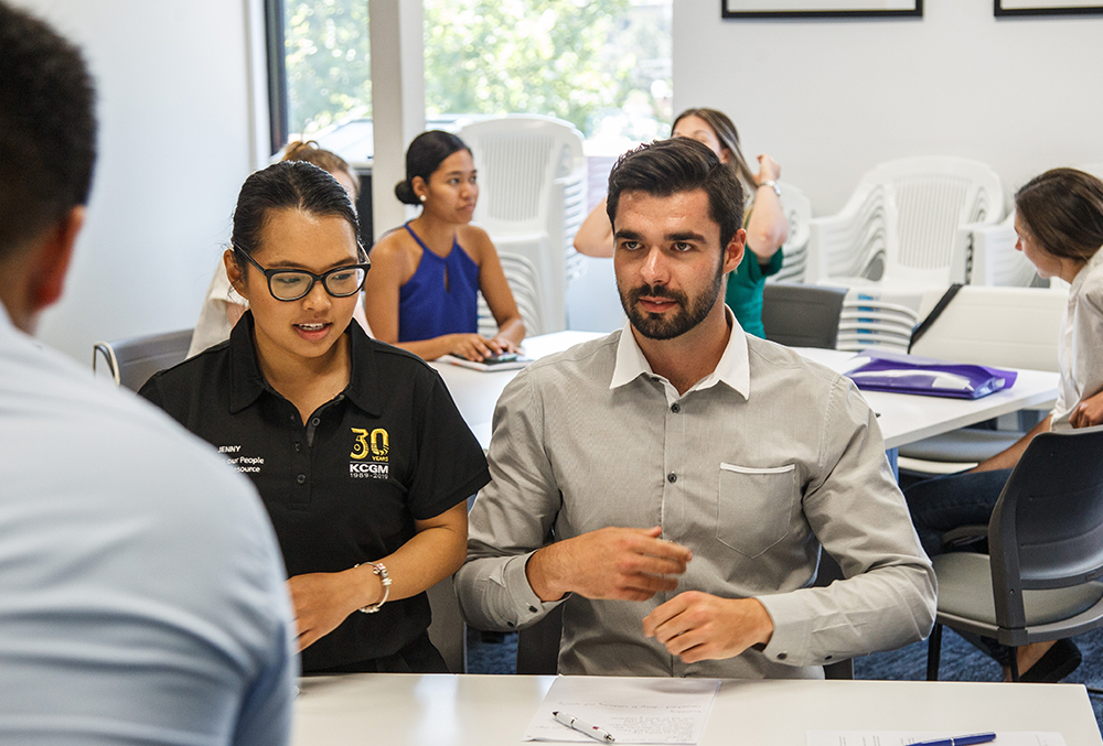 Newmont Graduate James Waterhouse in a team meeting