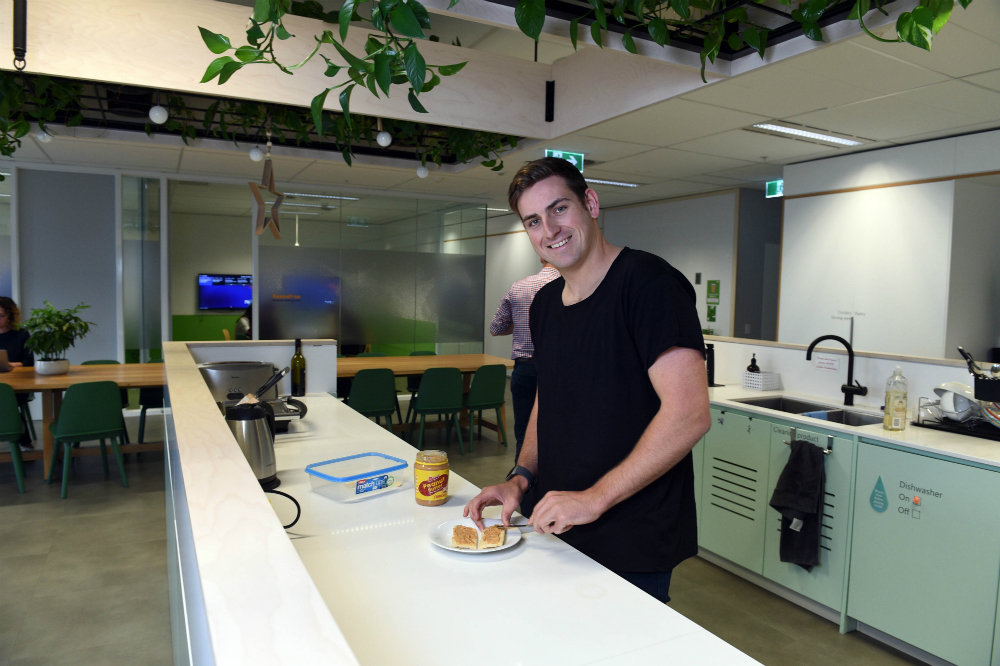 Nous Group Hamish Stein preparing a snack