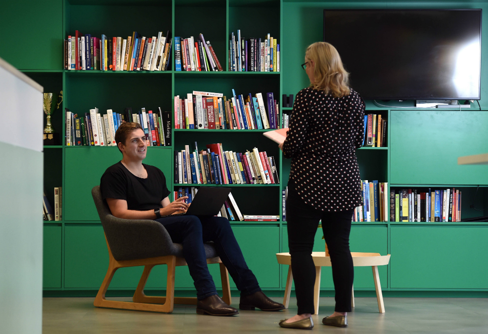 Nous Group Hamish Stein talking with his project director