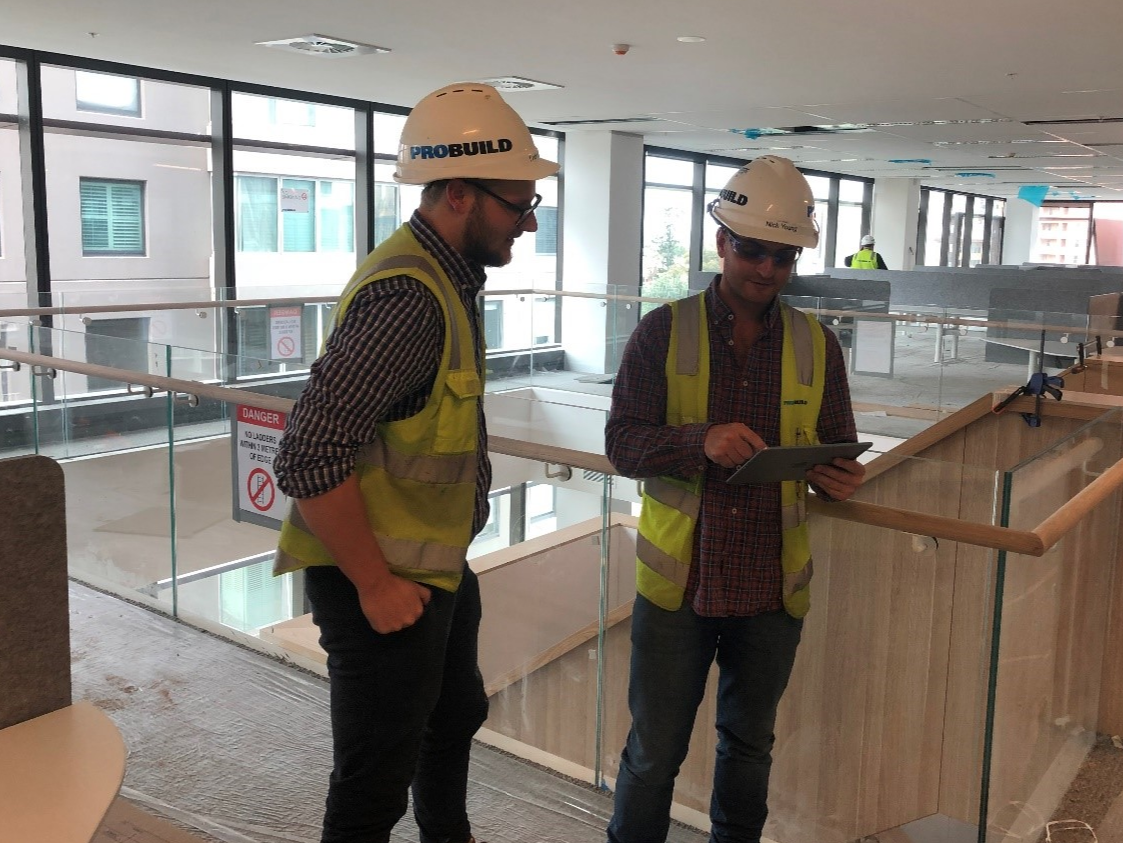 PROBUILD Nick Young with a colleague