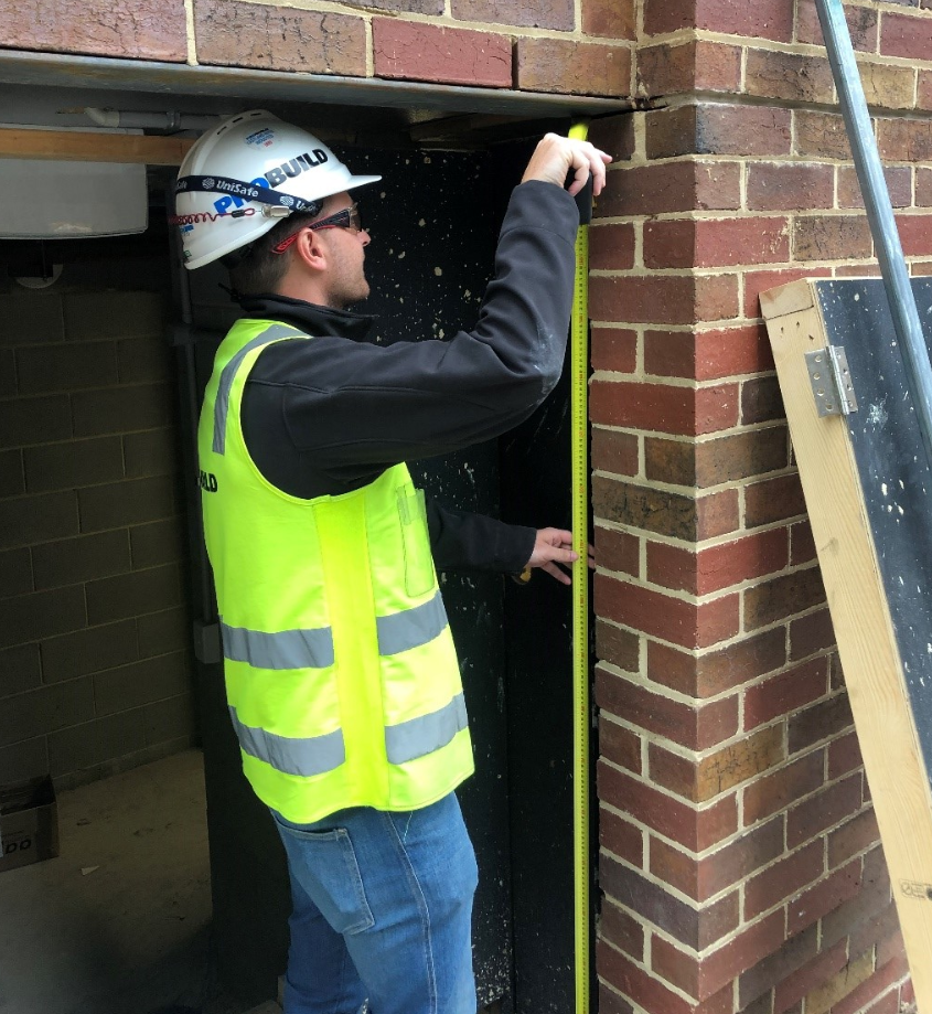 PROBUILD Nick Young grabbing a tape measure