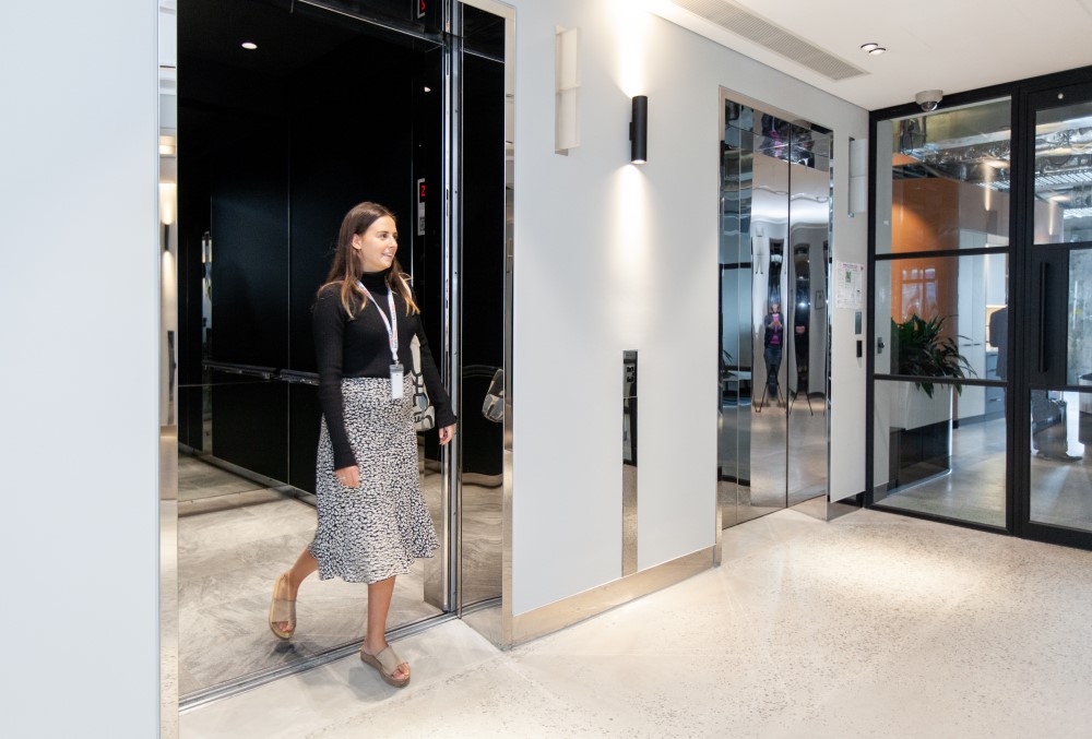 Kraft Heinz Graduate- Young professional walking through the door.