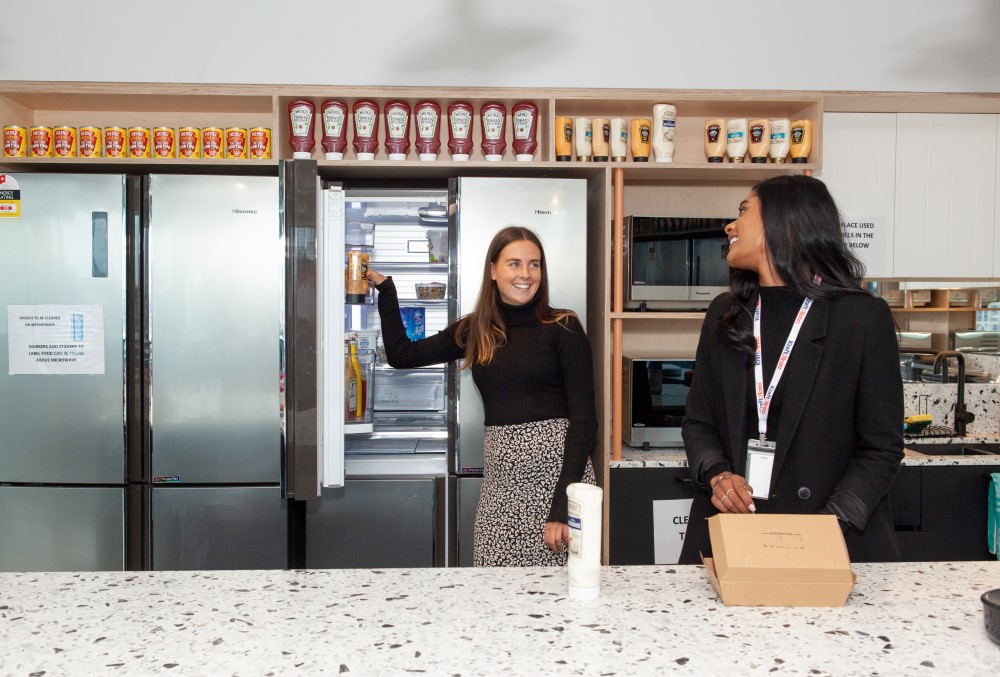 Kraft Heinz Graduate- Young marketing professional showing her products to a colleague.