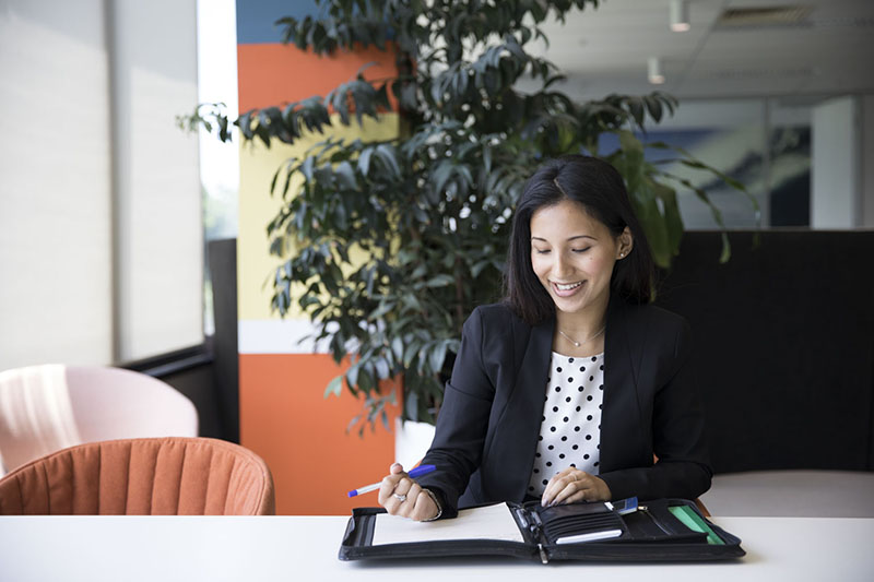 Sweta Dewan sitting in the office