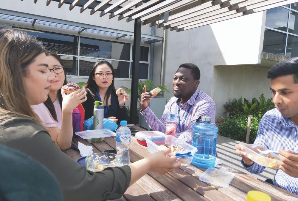 Day-in-the-life-TransGrid-Dan-Vu-Dan-during-lunch-break-with-colleagues