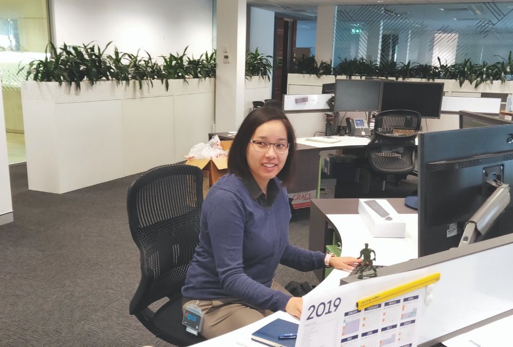 Day-in-the-life-TransGrid-Dan-Vu-working-on-her-desk