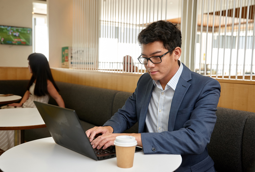 Stockland graduate Khang Hoang having morning coffee