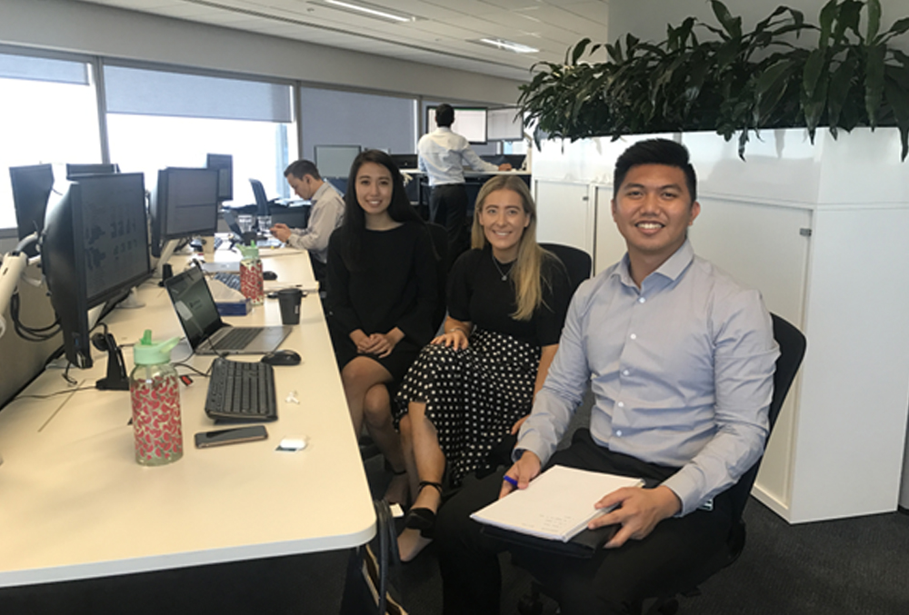 Grant Thornton Graduate Al Bautista meeting with colleagues