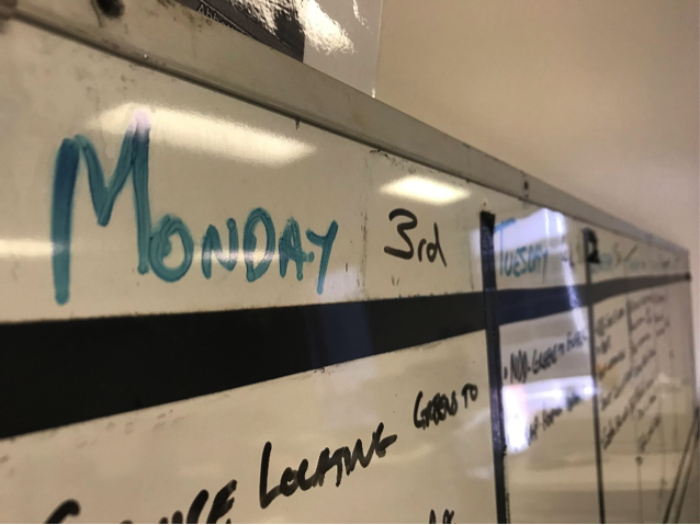Whiteboard on zoom in, Monday written