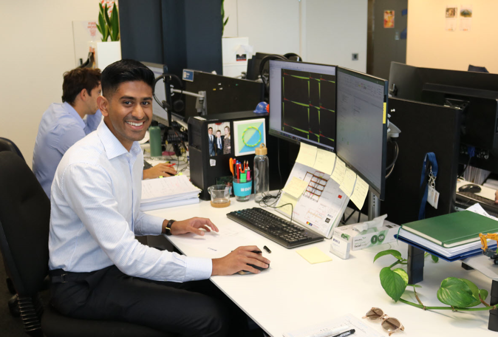 Beca Graduate- Young male engineer working on his computer.