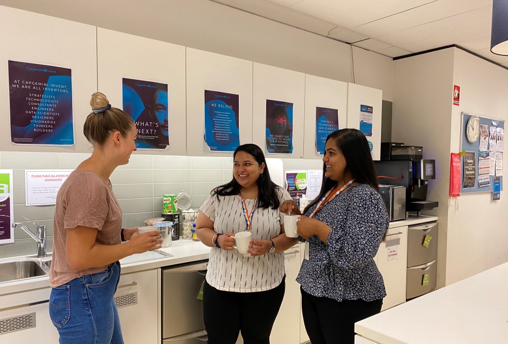 Capgemini Australia Graduate - Young female professional drinking coffee.