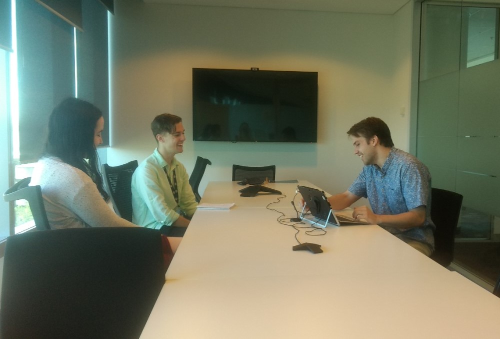Department of Agriculture, Water and the Environment Graduate - Young male professional meeting his team.