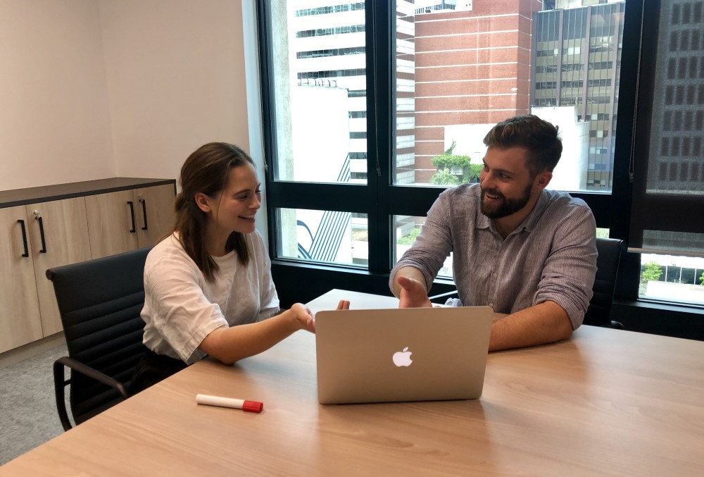 Meltwater Graduate - Young female professional meeting with her client